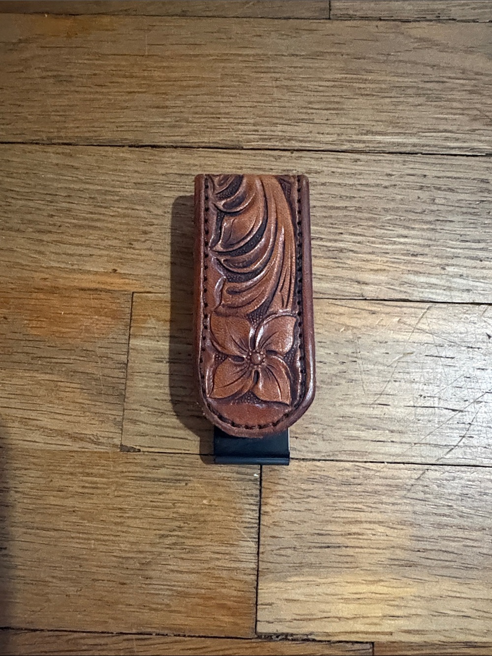 Hand-Tooled Brown Leather Money Clip with Floral Design